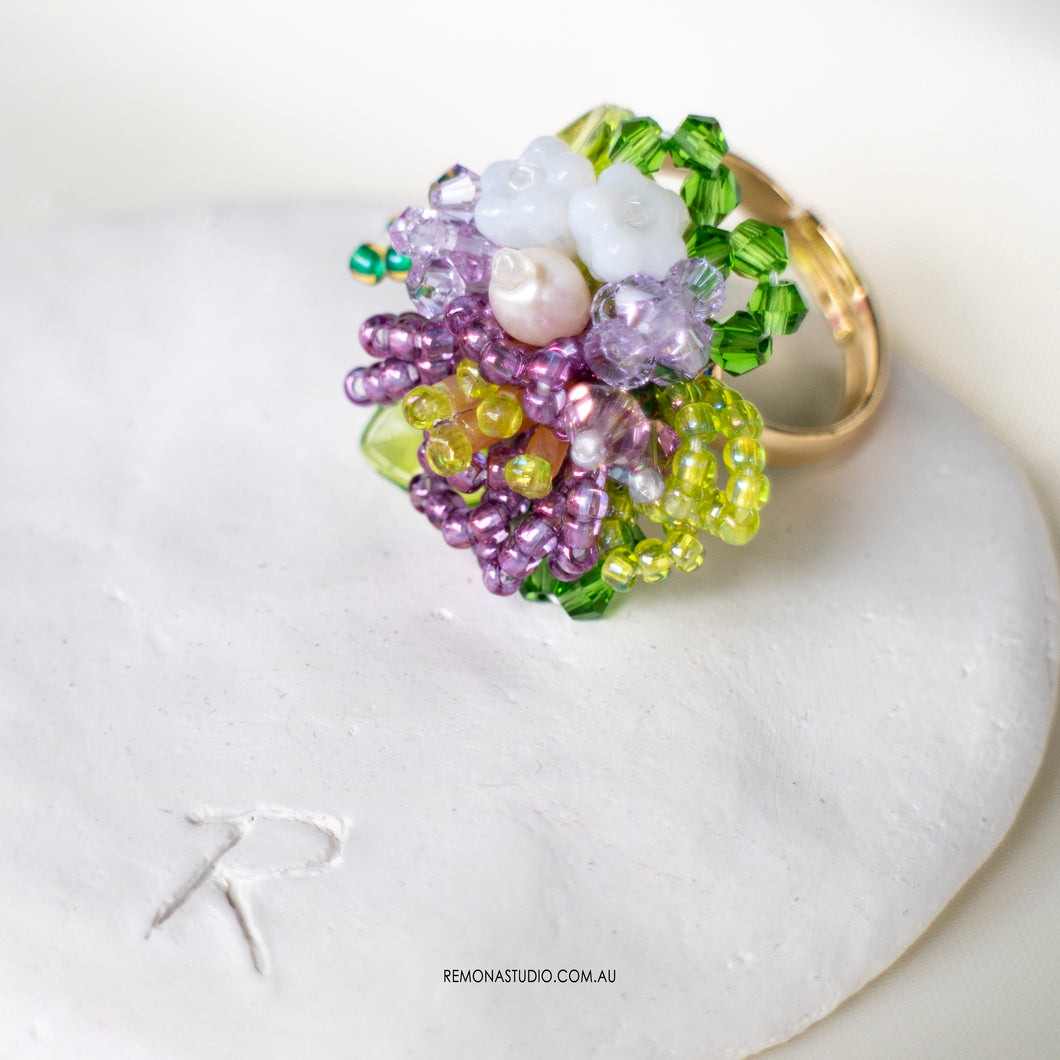 Dark purple flowers mini garden ring with a pearl