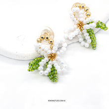 Load image into Gallery viewer, White elegant beaded flower with 925 sliver studs
