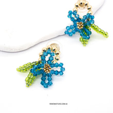 Load image into Gallery viewer, Peacock blue elegant beaded flower with 925 sliver studs
