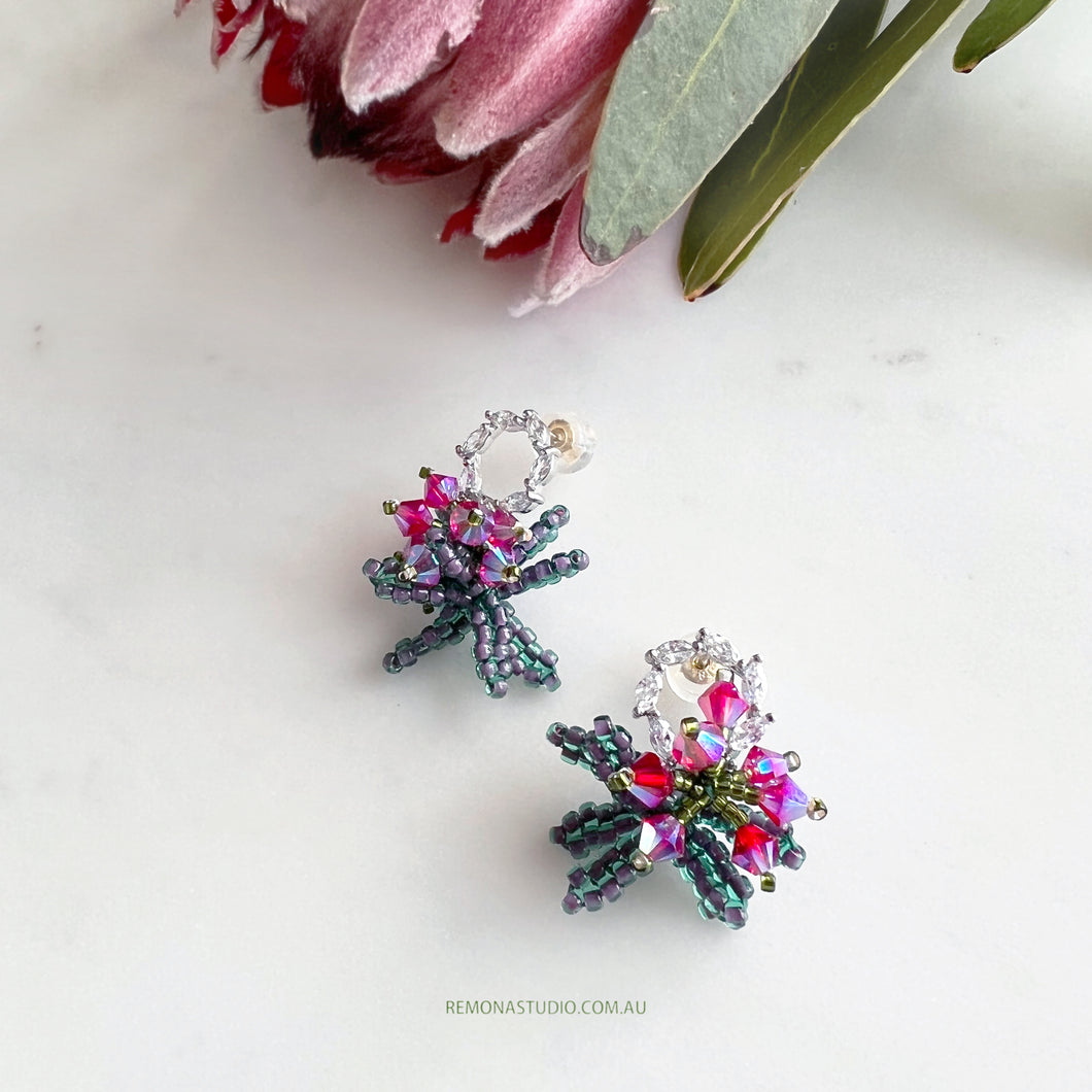 Sparkly rose-red beaded flower earrings with white gold-plated studs